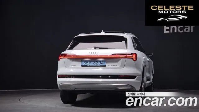 AUDI e-55 Quattro 2021 — photo 4 sur 26