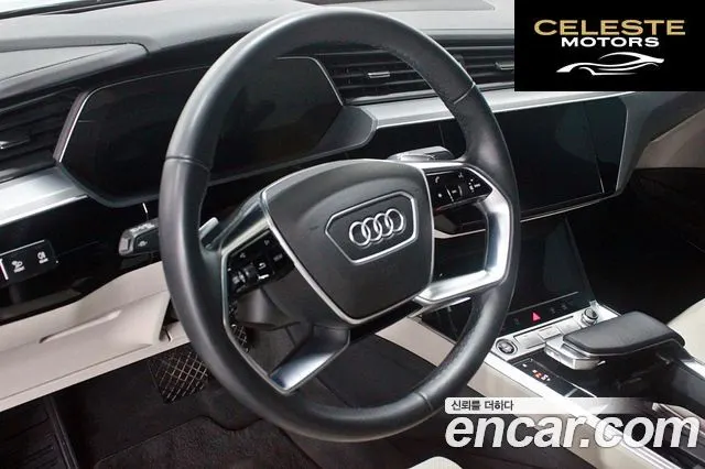 AUDI e-55 Quattro Sportback 2023 — photo 13 sur 26