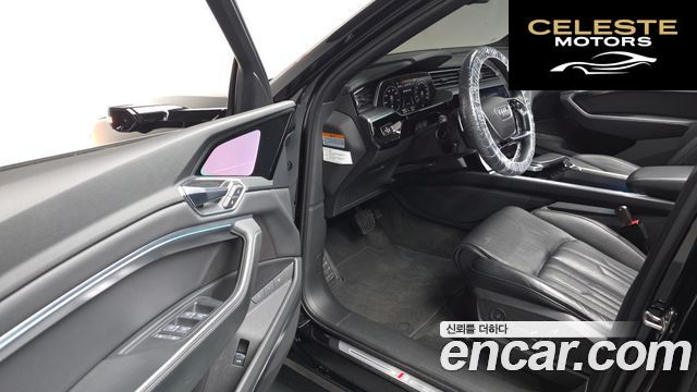 AUDI e-55 Quattro Sportback 2023 — photo 15 sur 34