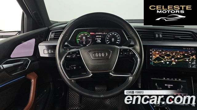 AUDI e-55 Quattro 2021 — photo 18 sur 34