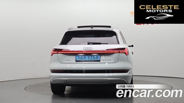 AUDI e-55 Quattro 2021 — photo 4 sur 34