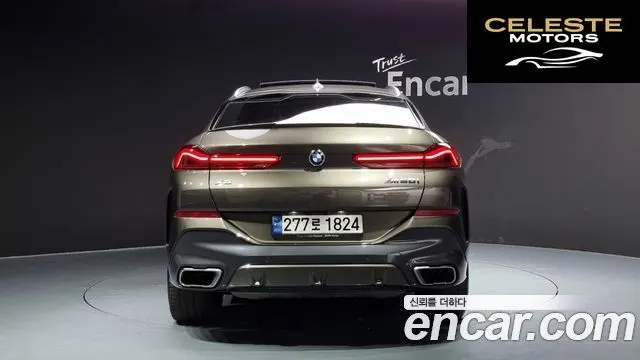 BMW X6 (G06) M50i 2021 — photo 4 sur 20
