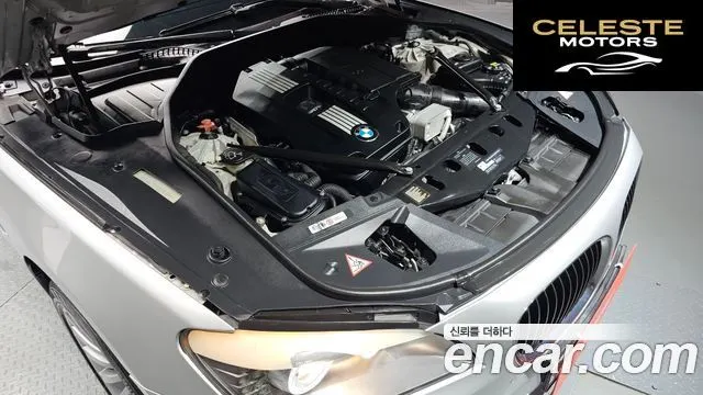 BMW Série 7 (F01) 740i 2012 — photo 6 sur 20