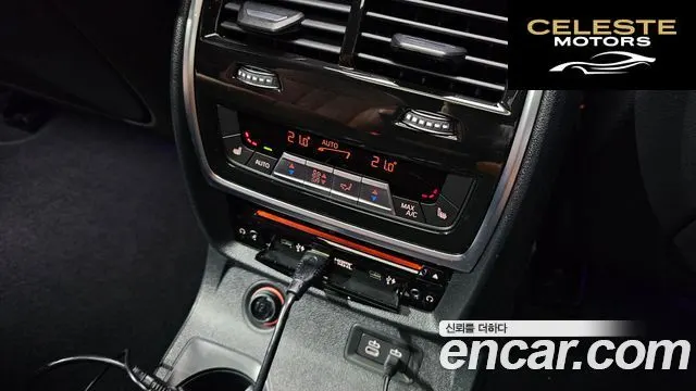 BMW X7 (G07) M50i 6 places 2022 — photo 18 sur 20