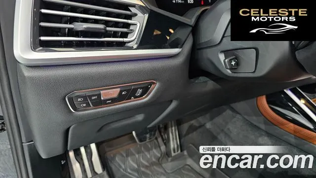 BMW X7 (G07) M50i 6 places 2022 — photo 20 sur 20