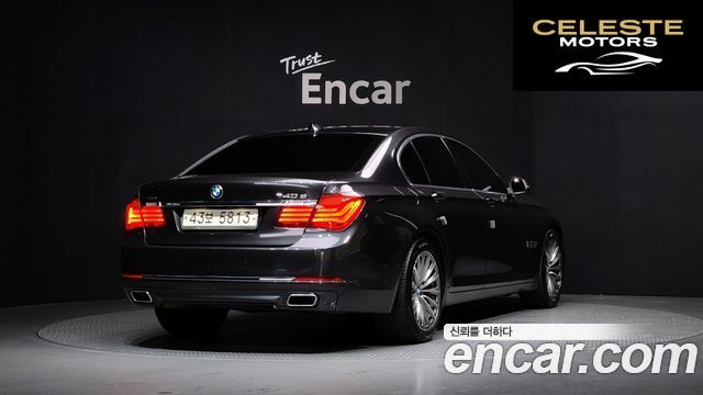 BMW Série 7 (F01) 740d xDrive 2015 — photo 2 sur 26