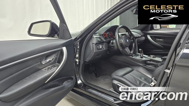 BMW Série 3 (F30) 320d xDrive Touring M Sport 2013 — photo 11 sur 20