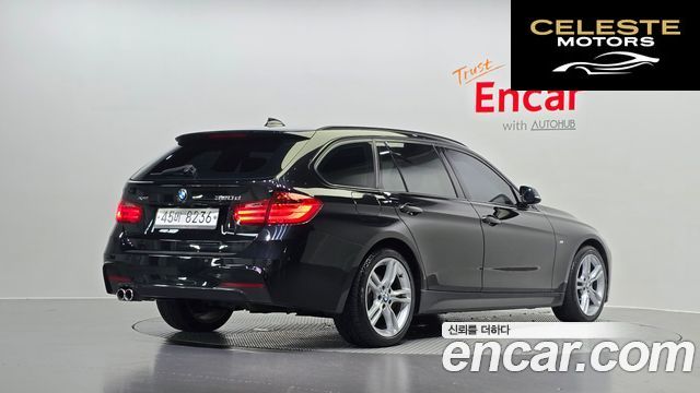 BMW Série 3 (F30) 320d xDrive Touring M Sport 2013 — photo 2 sur 20