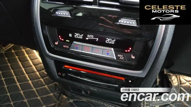 BMW X7 (G07) xDrive 40i Design Pure Excellence 7 places 2021 — photo 17 sur 20