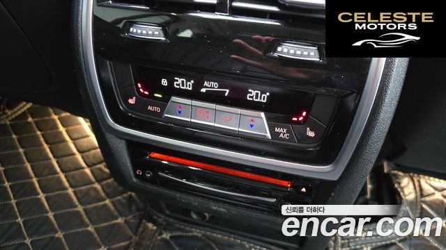 BMW X7 (G07) xDrive 40i Design Pure Excellence 7 places 2021 — photo 17 sur 20