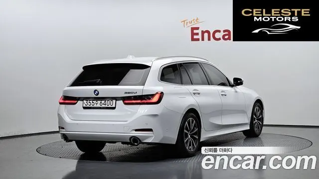 BMW Série 3 (G20) 320d Touring 2023 — photo 2 sur 20