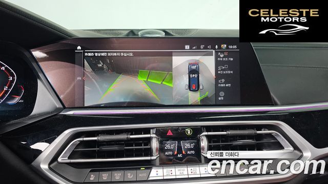 BMW X7 (G07) M50i 6 places 2021 — photo 15 sur 20