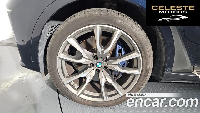 BMW X7 (G07) M50i 6 places 2021 — photo 5 sur 20