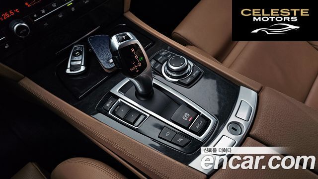 BMW Série 7 (F01) 740i M Sport 2010 — photo 9 sur 20