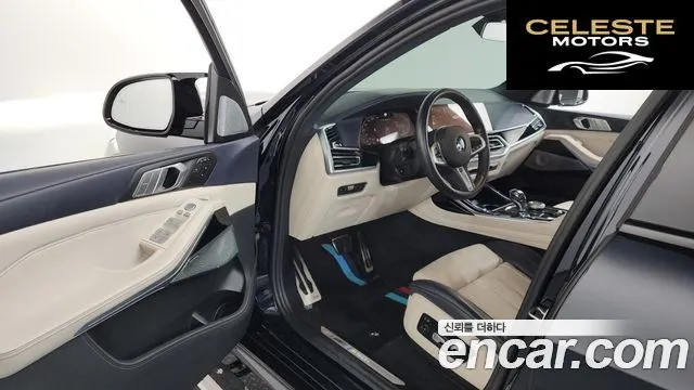 BMW X7 (G07) M50i 6 places 2022 — photo 10 sur 20