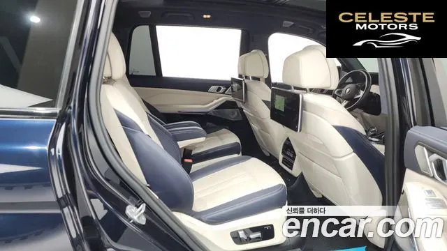 BMW X7 (G07) M50i 6 places 2022 — photo 12 sur 20