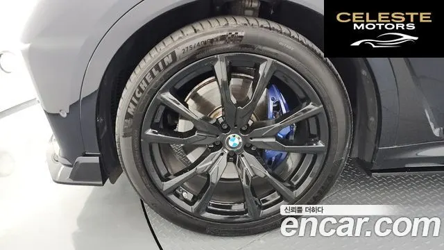 BMW X7 (G07) M50i 6 places 2022 — photo 5 sur 20