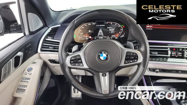 BMW X7 (G07) M50i 6 places 2022 — photo 13 sur 20
