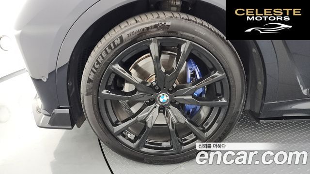 BMW X7 (G07) M50i 6 places 2022 — photo 5 sur 20