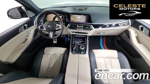 BMW X7 (G07) M50i 6 places 2022 — photo 7 sur 20