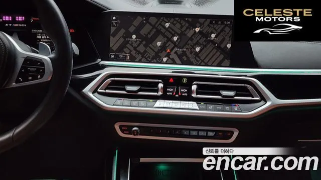 BMW X7 (G07) M50i 6 places 2022 — photo 15 sur 20