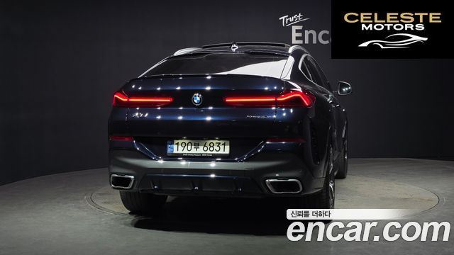 BMW X6 (G06) xDrive40i M Sport 2022 — photo 4 sur 26