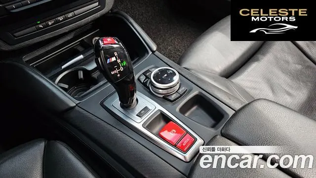 BMW X6M (E71) 4.4 2010 — photo 9 sur 26