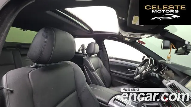 BMW Série 5 (F10) M550d xDrive 2014 — photo 12 sur 20