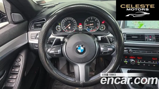 BMW Série 5 (F10) M550d xDrive 2014 — photo 14 sur 20
