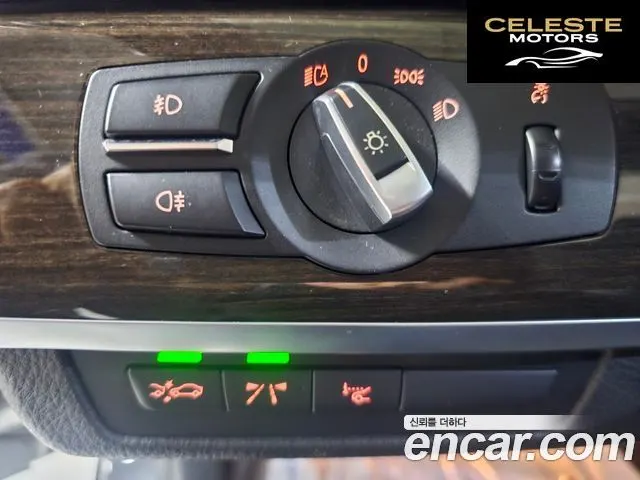 BMW Série 7 (F01) 740i 2012 — photo 14 sur 26