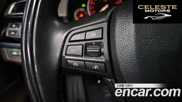 BMW Série 7 (F01) 750Ld xDrive 2015 — photo 18 sur 26