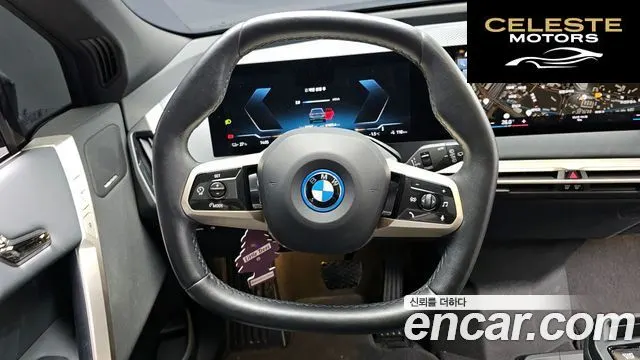 BMW iX xDrive50 Sport Plus 2022 — photo 12 sur 20