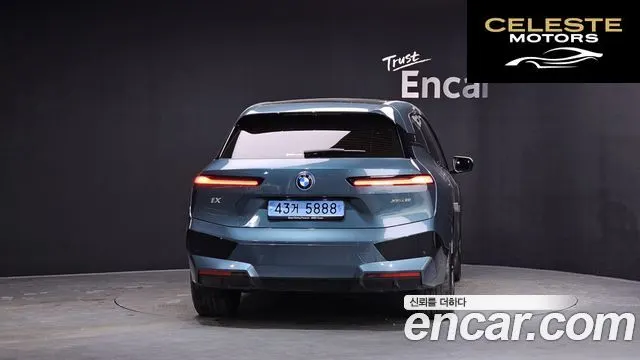 BMW iX xDrive50 Sport Plus 2022 — photo 3 sur 20