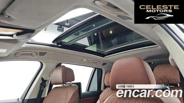 BMW X7 (G07) M50i 6 places 2021 — photo 19 sur 20