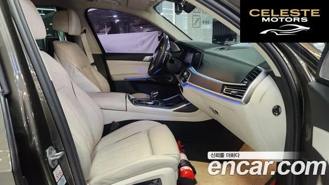 BMW X7 (G07) xDrive 40i Design Pure Excellence 7 places 2022 — photo 12 sur 26