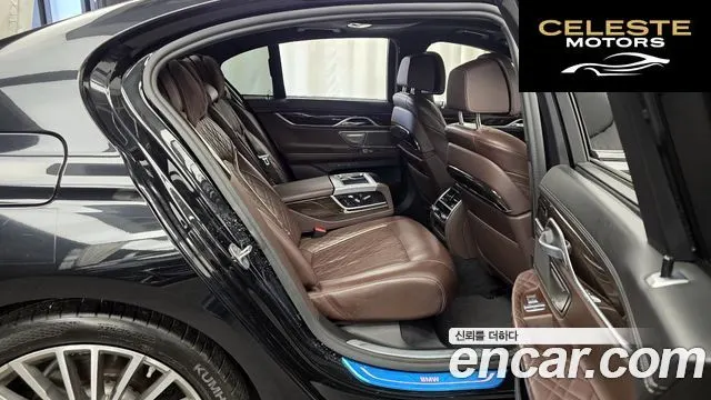 BMW Série 7 (G11) 740d xDrive Design Pure Excellence 2021 — photo 12 sur 26