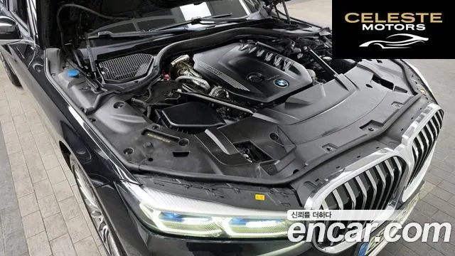 BMW Série 7 (G11) 740d xDrive Design Pure Excellence 2021 — photo 6 sur 26