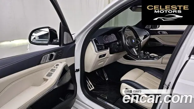 BMW X7 (G07) M50i 6 places 2021 — photo 10 sur 20
