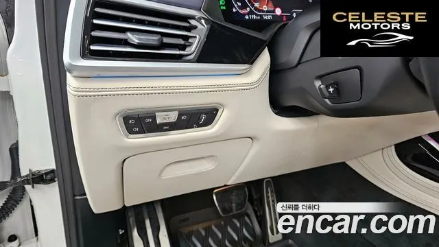 BMW X7 (G07) M50i 6 places 2021 — photo 16 sur 20