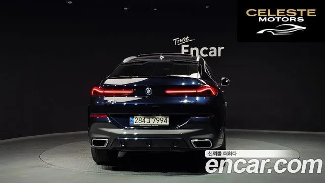 BMW X6 (G06) xDrive40i M Sport 2022 — photo 4 sur 26