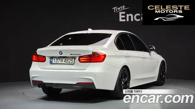 BMW Série 3 (F30) 328i Sport 2015 — photo 2 sur 26