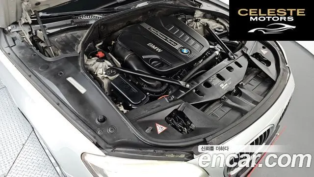 BMW Série 7 (F01) 730d xDrive 2014 — photo 6 sur 26