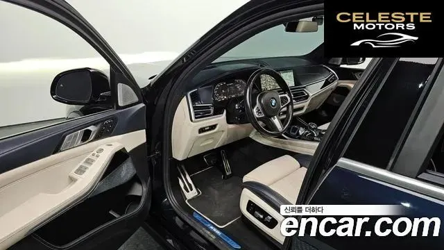 BMW X7 (G07) M50i 6 places 2021 — photo 10 sur 26