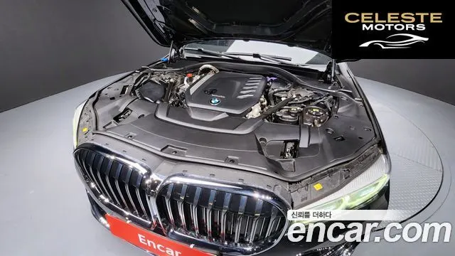 BMW Série 7 (G11) 740d xDrive Design Pure Excellence 2021 — photo 6 sur 20