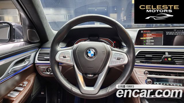 BMW Série 7 (G11) 740d xDrive Design Pure Excellence 2021 — photo 14 sur 20