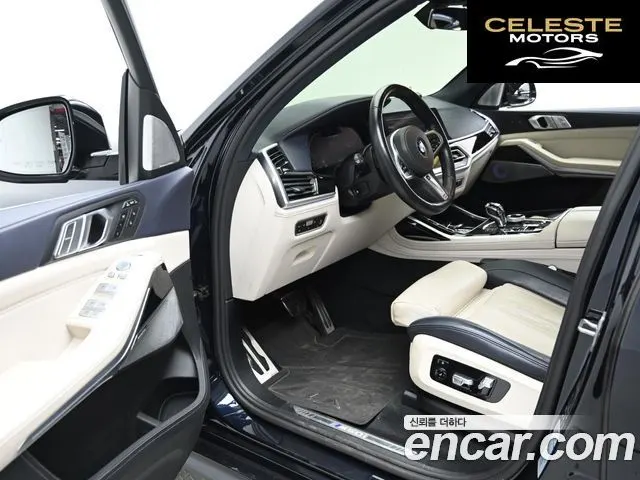 BMW X7 (G07) M50i 6 places 2021 — photo 11 sur 26