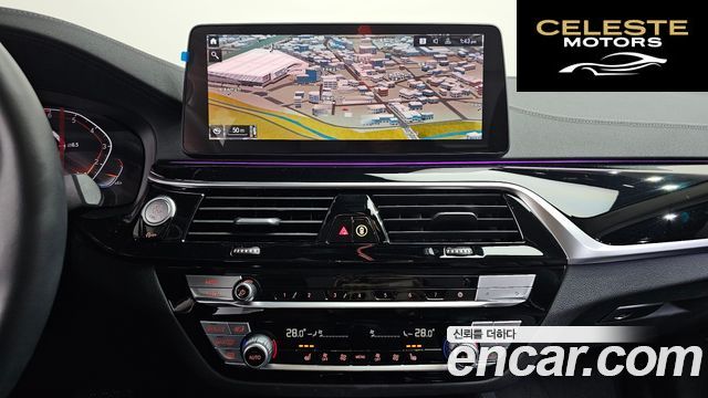 BMW Série 5 (G30) 520i Luxury 2022 — photo 14 sur 26
