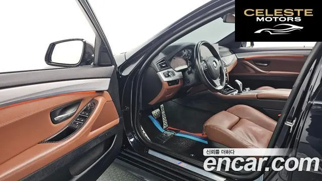 BMW Série 5 (F10) 550i xDrive 2013 — photo 11 sur 26