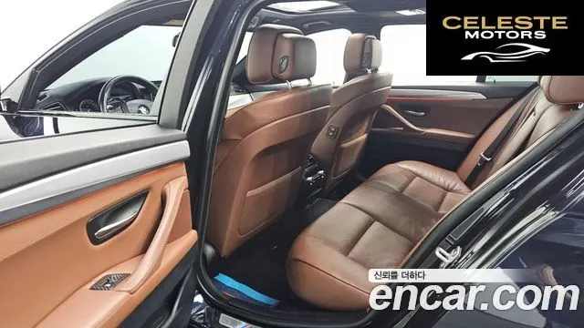 BMW Série 5 (F10) 550i xDrive 2013 — photo 12 sur 26