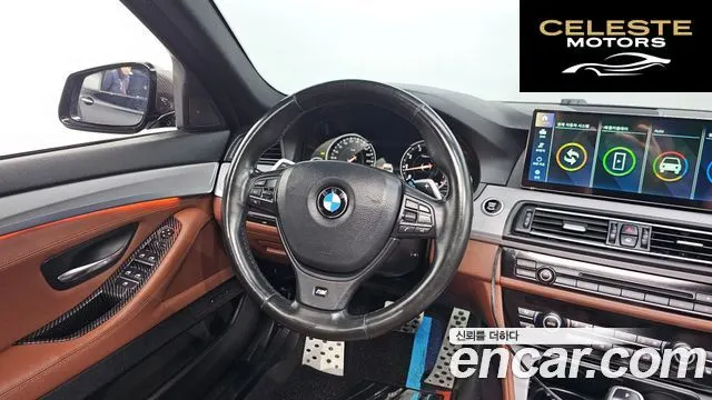 BMW Série 5 (F10) 550i xDrive 2013 — photo 13 sur 26
